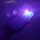 A homemade 'Purple Light' made by pasting cellophane over a smartphone's flashlight.